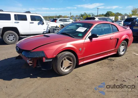1999 Ford Mustang z USA, uszkodzony, nr VIN 1FAFP4041XF215271